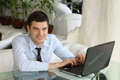 Handsome smiling men with laptop. White teeth. businessman. Port — Stock Photo © VictoriaAndrea ...