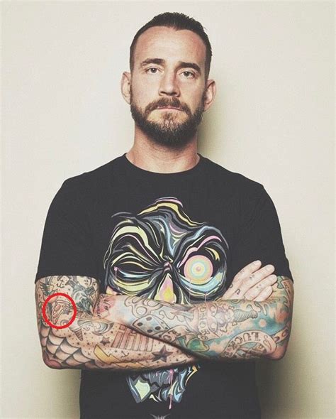 CM Punk’s 51 Tattoos & Their Meanings – Body Art Guru