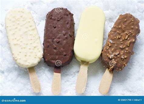 Ice cream on stick in ice stock photo. Image of confectionery - 55821790