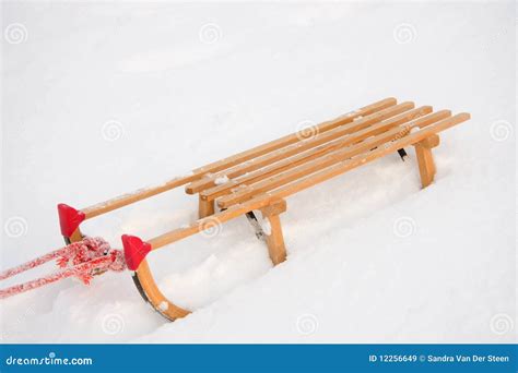 Wooden sledge in the snow stock image. Image of snow - 12256649