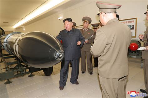 Kim Jong-un reveals nuclear warhead, calls for more weapons-grade material - Asia News ...