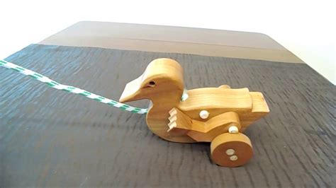 duck animated wood pull toy - YouTube