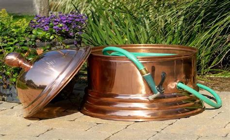 23 Creative Ways To Store Your Garden Hose - Garden Lovers Club