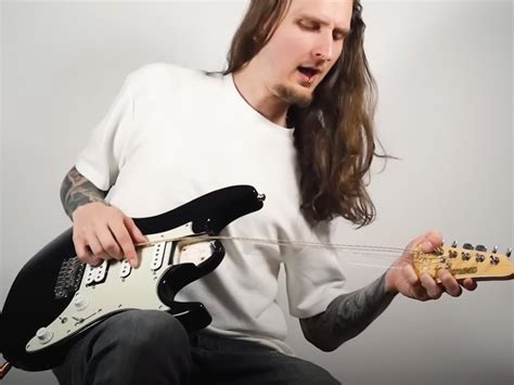 YouTuber builds neckless guitar and creates a whole song with it