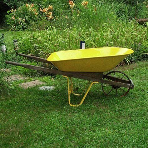 Vintage wheelbarrow repainted! So cute for your garden and yard. Fill ...