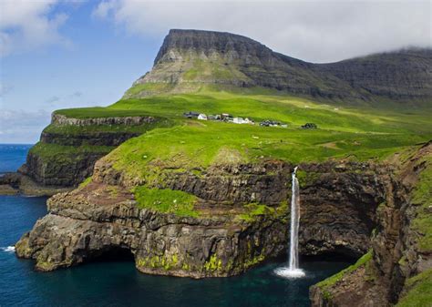 Alone on a clifftop, Gásadalur Village almost disappeared as its population moved away.