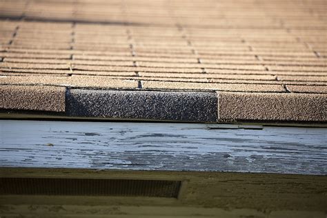 How to Spot Wind Damage to Roof Shingles (What To Do After the Storm)