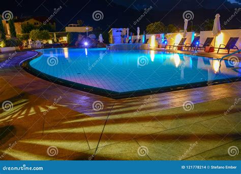 Swimming Pool at a Luxury Resort by Night in Lana Editorial Stock Image ...