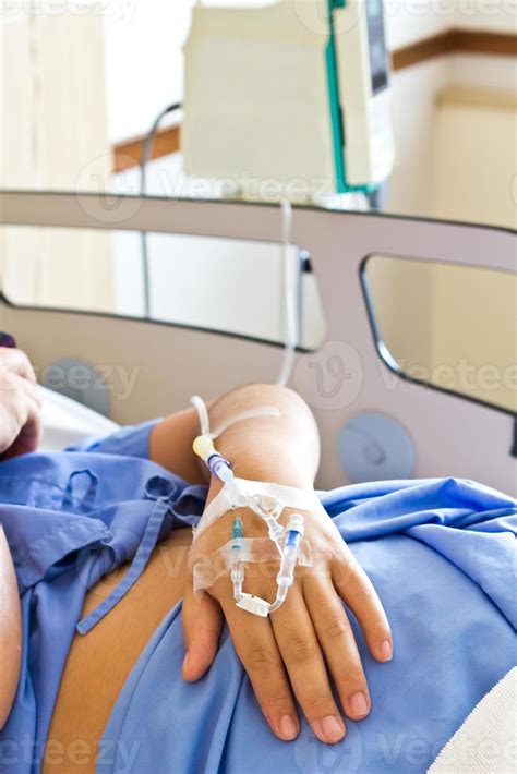 hand patient with an intravenous drip 993768 Stock Photo at Vecteezy