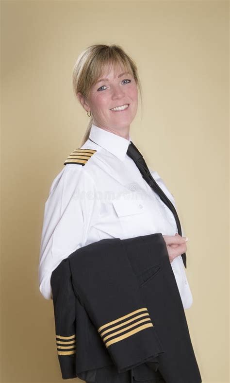 Female pilot in uniform stock image. Image of four, high - 51504169