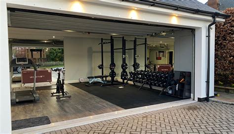 7 inspirational garage gym ideas & designs - motive8