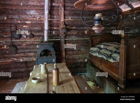 Rustic log cabin interior with wooden furniture Stock Photo - Alamy