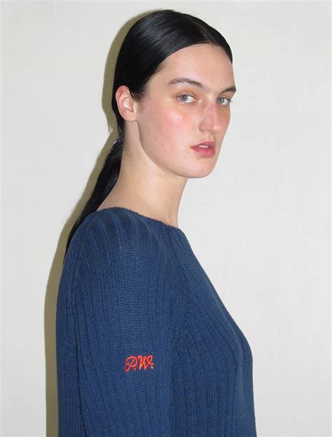 SHIITAKE- Navy thick ribbed sweater with irregular bottom detail