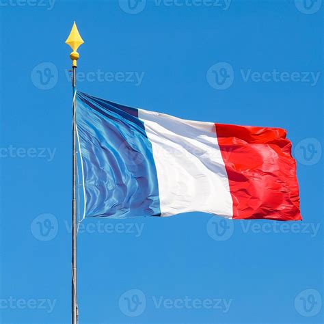 France tricolor flag waving into blue sky 6880580 Stock Photo at Vecteezy