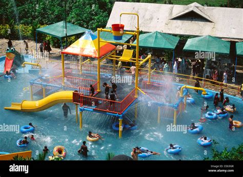 People enjoying in water park resort ; Veegaland ; Wonderla ; amusement ...