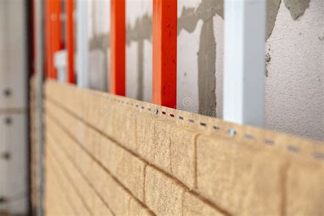 Installing Brick Siding on the Wall of the House Stock Photo - Image of ...