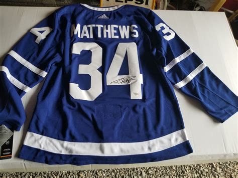 TORONTO MAPLE LEAFS JERSEY (SIGNED BY AUSTIN MATTHEWS) SIZE XL *BRAND NEW*