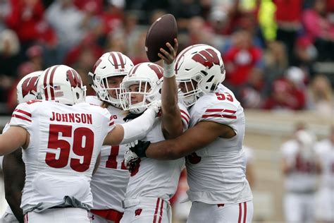 Wisconsin football in danger of missing Playoff at 13-0? - SBNation.com