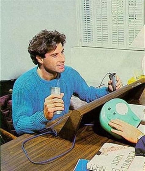 John Travolta during a Scientology auditing session, c. 1991. : scientology