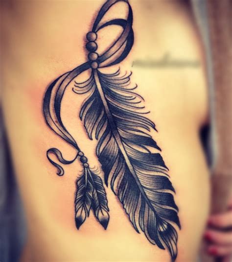 62+ Stunning Feather Tattoo Ideas | Feather tattoos, Indian feather tattoos, Tribal feather tattoos