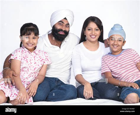 PORTRAIT OF A SIKH SARDAR FAMILY OF FOUR Stock Photo - Alamy