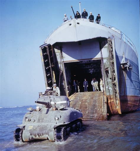 A Dravo built LST landing a tank on a beach during World War II. : wwiipics