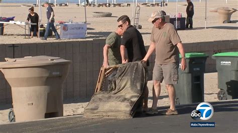 Volunteers team up for Huntington Beach cleanup, donate to Coast Guard ...