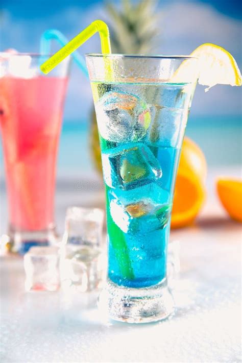 Set of Exotic Drinks on the Beach with Blue Ocean Background Stock Image - Image of party ...