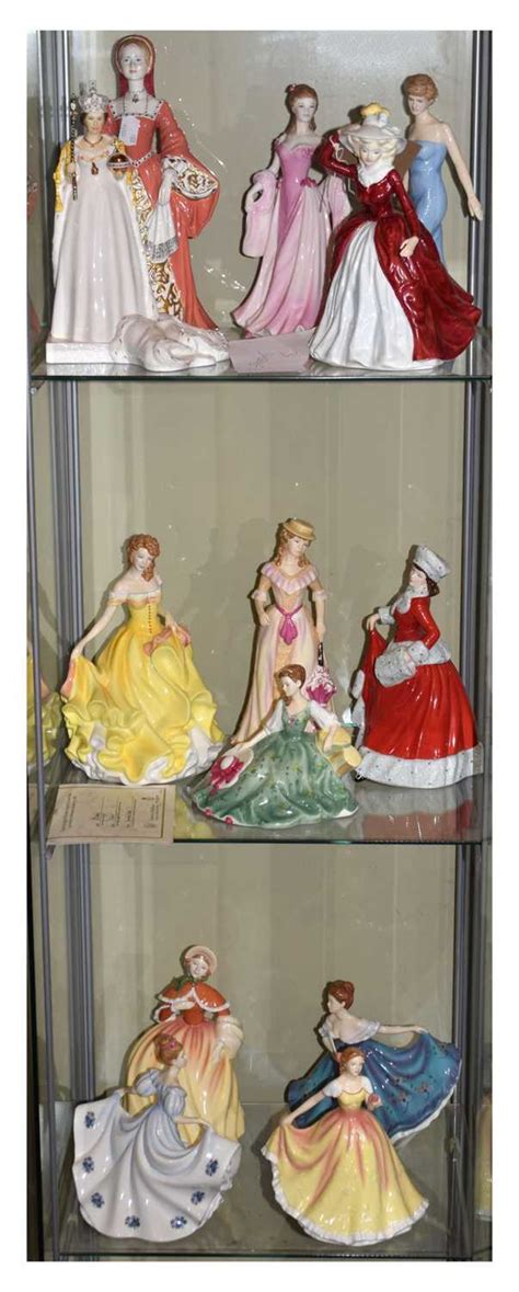 Lot 279 - Eight Royal Doulton 'Pretty Ladies' series