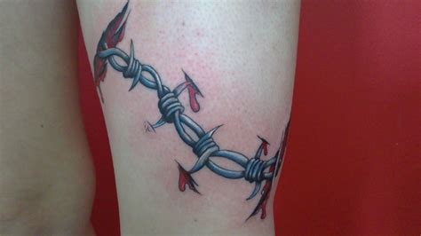 Ripped Skin Barbed Wire Tattoo On Half Sleeve | Tatuajes con significado, Tatuajes antebrazo ...