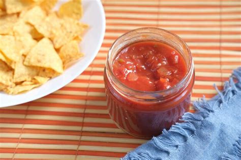 Premium Photo | A bowl of chips and salsa on table