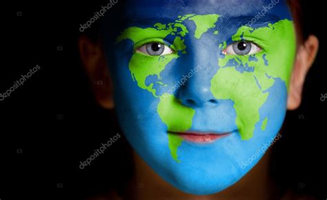 Portrait of a child with a painted world map Stock Photo by ©TpaBMa2 13822997