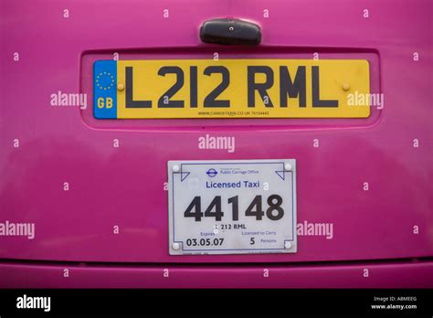 License plate on pink vehicle in London, England Stock Photo - Alamy