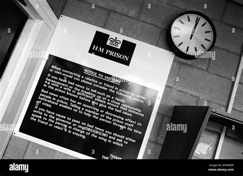 A sign at the entrance to a uk prison Stock Photo - Alamy