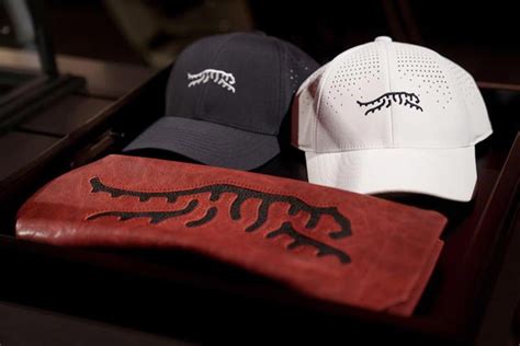 Tiger Woods unveils Sun Day Red, a new apparel brand with TaylorMade. Here's what it means