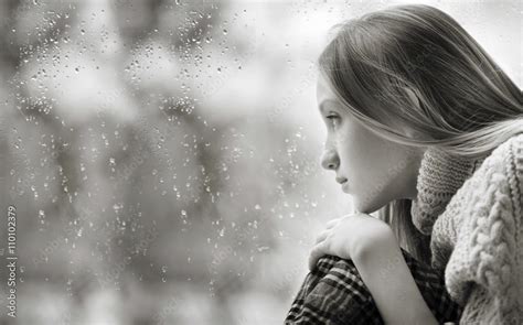 Rainy Day: sad Girl on the Window Black And White Stock Photo | Adobe Stock