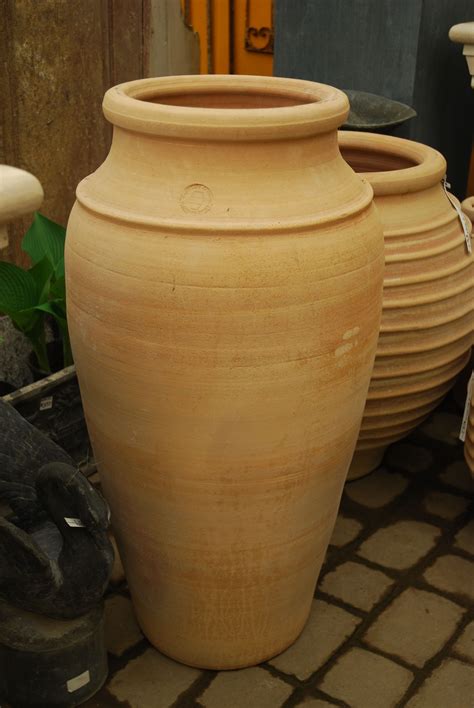 We have a variety of Greek terracotta pots. This tall elegant pot one ribbed pot is perfect for ...