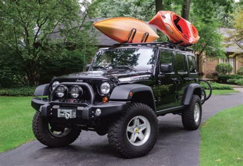 Total 72+ imagen jeep wrangler adventure rack - Abzlocal.mx