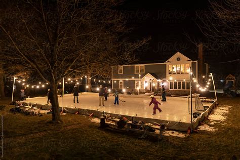 "Family Together Cold Winter Lifestyle Home Backyard Ice Skating Rink ...