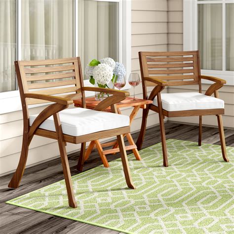 Winston Porter Brizio Patio Dining Chair with Cushion & Reviews | Wayfair