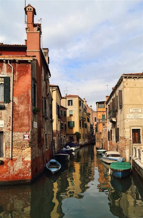 Historical Houses on a Canal in Venice, Italy Stock Photo - Image of water, cloudy: 143622886