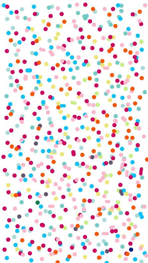 colorful confetti sprinkles on white background