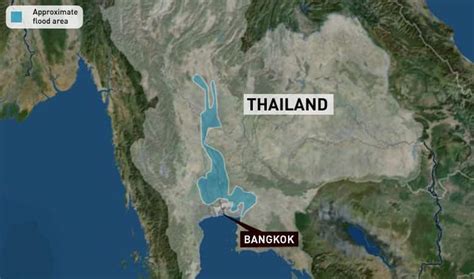 CBC News - Rising floodwaters threaten Bangkok