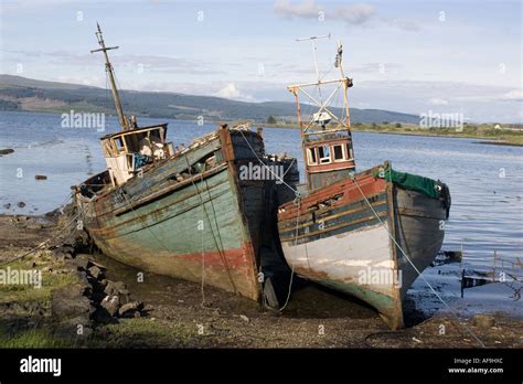 Old fishing boats rotting on beach Isle of Mull Scotland UK Stock Photo: 7929451 - Alamy