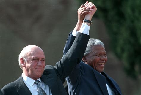 F. W de Klerk and Nelson Mandela, c. 1990. The photo that effectively ...