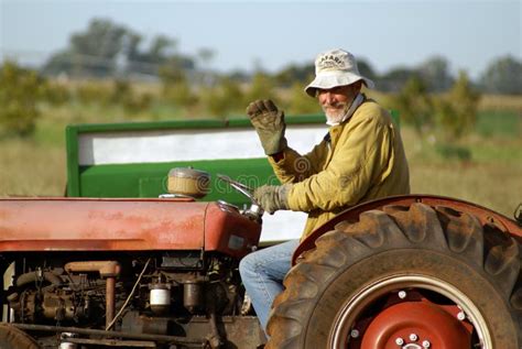 Farmer On Tractor Royalty Free Stock Image - Image: 2624776