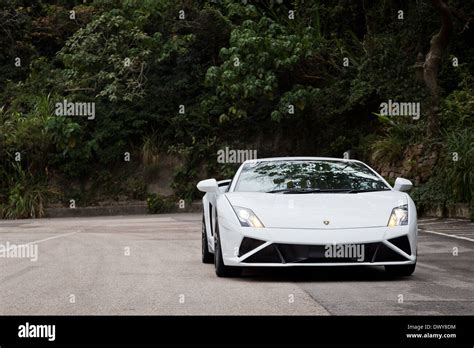 Lamborghini LP560-4 Super Car in white colour Stock Photo - Alamy