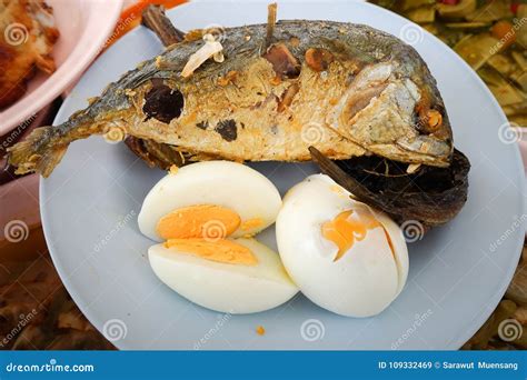 Fried Fish and Eggs on Plate. Stock Image - Image of bread, layer ...