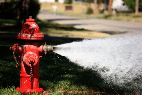 Open Fire Hydrant Spraying High Pressure Water Stock Image - Image of ...