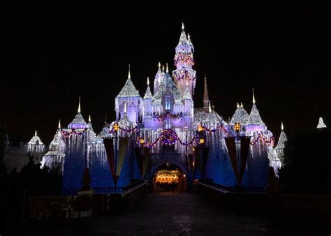 Sleeping Beauty Castle decorated with Christmas lights and ...